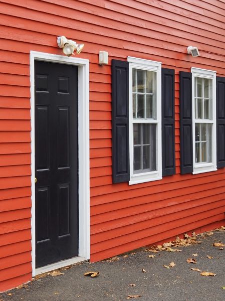 Red Vinyl Siding Installation in Blaine